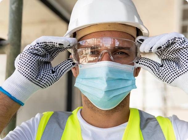 Worker with eye protection